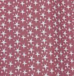 Tela estrellas diferentes tamaños fondo rosa